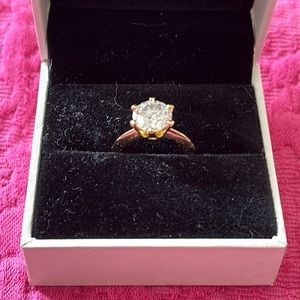 Gold plated, six prong cushion cut cubic CZ three karat goldplated promise ring
